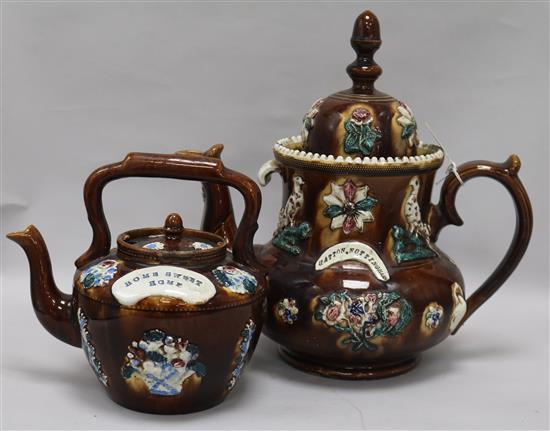 A Bargeware teapot and another, height 36cm and 24cm